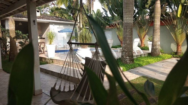Linda Casa com piscina no Guarujá para 16 pessoas
